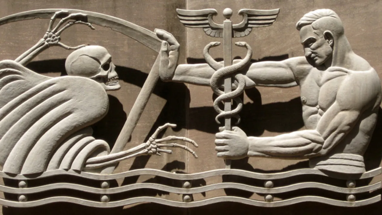 a picture of two figures incorporating various modern medical symbols - pharmakeia